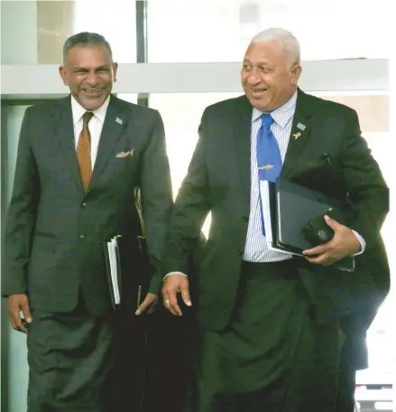  ?? Photo: Kelera Sovasiga ?? Prime Minister Voreqe Bainimaram­a and Minister for Commerce, Trade, Tourism and Transport, Faiyaz Koya outside of Parliament on August 31, 2020.