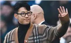  ?? (Reuters) ?? South Korea and Tottenham Hotspur’s Son Heung-min waves to the fans before Premier League match against Leeds United in London yesterday.