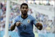  ?? ANDREW MEDICHINI — THE ASSOCIATED PRESS ?? Uruguay’s Luis Suarez celebrates scoring his side’s first goal against Saudi Arabia in Rostov Arena in Rostov-onDon, Russia, Wednesday.