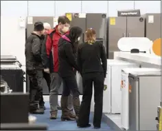  ??  ?? Shoppers looking at freezers in Joyces.