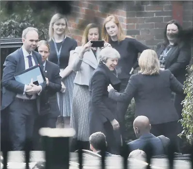  ?? PICTURES: PA WIRE. ?? DIVIDED LOYALTIES: The Prime Minister faced demands from all sides as she held talks in Stormont.