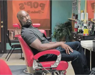  ?? DAVID LEE THE ASSOCIATED PRESS ?? Mike Colter in a scene from "Luke Cage.” The second season is streming on Netflix.