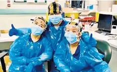  ??  ?? Northwick Park Hospital nurses wear clinical waste bags on their heads for protection