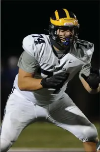  ??  ?? Highly-recruited Clarkston offensive tackle Garrett Dellinger will be playing football next season at LSU. Dellinger selected LSU over Michigan, Penn State and Ohio State in June.