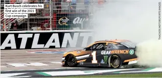  ??  ?? Kurt Busch celebrates his first win of the 2021
Cup campaign