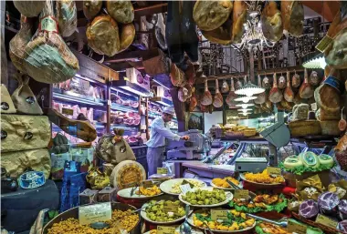  ??  ?? WORKS OF ART: The Modena Enzo Ferrari museum. Above: Mouth-watering deli items in Bologna