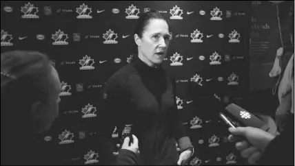  ?? CP photo ?? Head Coach Laura Schuler, of Canada’s National Women’s Team, speaks to media during a press conference in Edmonton on Sunday.