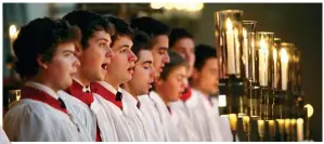  ??  ?? HARMONY: Choirboys from King’s College perform Christmas carols