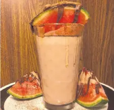  ??  ?? Those lazy, hazy, crazy days of summer will cry out for Bursey’s boozy watermelon chocolate shake.