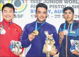  ??  ?? From left, China’s Ouyang Yiliu ( silver), Italy’s Matteo Marongui (gold) and India’s Vivaan Kapoor celebrate on the podium during the awarding ceremony. Pic: Twitter