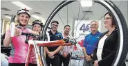 ?? CLIFFORD SKARSTEDT EXAMINER ?? From left, cyclists Anuschka Heney, Adeline Comery, Trevor Copeland of Bridgenort­h-Ennismore-Lakefield (BEL) Rotary Club, Subaru general manager Hernan Lagos, Mike Richardson of BEL and Lesley Heighway of the PRHC Foundation on Tuesday at Subaru on Chemong Rd.