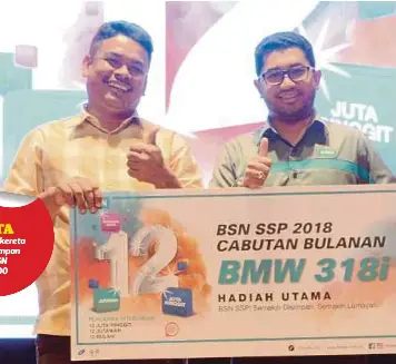  ??  ?? BASRI (kiri) bersama Naib Presiden/Ketua Perbankan Islam BSN, Mohd Supian Mat Nan.