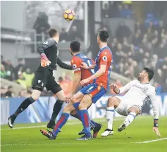  ??  ?? Chelsea’s Diego Costa scores their first goal. — Reuters photo