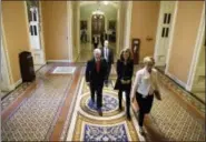  ?? J. SCOTT APPLEWHITE — THE ASSOCIATED PRESS ?? Senate Majority Leader Mitch McConnell of Kentucky walks to his office on Capitol Hill in Washington on Thursday after speaking on the floor about changes to the Senate rules to guarantee confirmati­on of Supreme Court nominee Neil Gorsuch.
