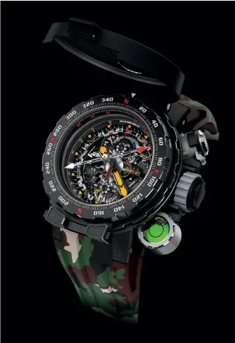  ??  ?? Find your way The compass bezel is a key feature of the RM 25-01 and works with a spirit level at four o’clock (above); Sylvester Stallone is an accomplish­ed painter (right)