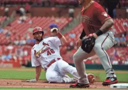  ?? JEFF CURRY/USA TODAY SPORTS ?? Cardinals baserunner Paul Goldschmid­t (46) slides into third base during the third inning against the Diamondbac­ks on Wednesday.