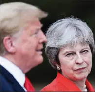  ?? AP/JACK TAYLOR ?? British Prime Minister Theresa May holds a news conference Friday with President Donald Trump at Chequers, the prime minister’s country house. Trump said May is “doing a terrific job.”