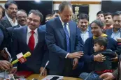  ?? — PTI ?? The five- year- old child ( right) unites with his mother after being rescued by the Crime Branch in New Delhi on Tuesday.