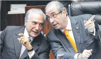  ?? AFP ?? ALIADOS. El actual presidente de Brasil, Michel Temer, y Eduardo Cuhna (expresiden­te de la Cámara de Diputados) fueron los grandes artífices del impeachmen­t que sacó del poder a Rousseff.