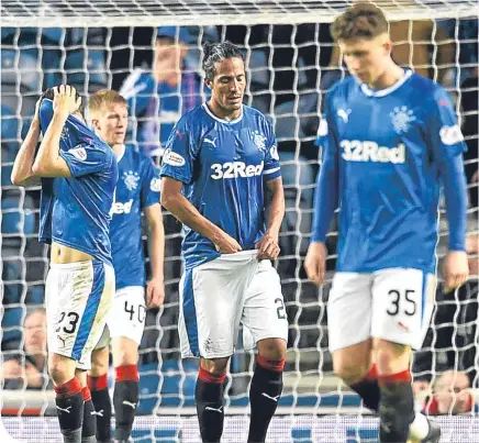  ??  ?? The reaction to Kilmarnock’s late midweek equaliser is etched on these Rangers players’ faces