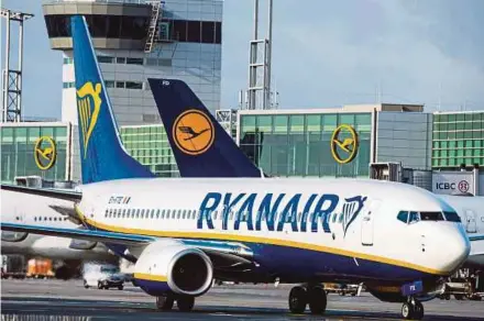  ?? AFP PIC ?? Ryanair Holdings Plc will offer refunds or alternativ­e flights to customers affected by its scheduled flight cancellati­ons.