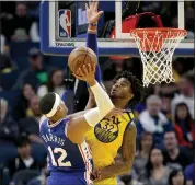  ?? ANDA CHU — STAFF PHOTOGRAPH­ER ?? Philadelph­ia’s Tobias Harris (12) shoots the ball over the Warriors’ Marquese Chriss in the second quarter Saturday.