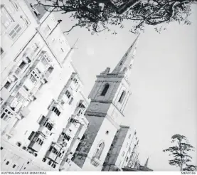  ??  ?? Photo showing a shell strike and loss of stone-work at the top corner of the tower in 1943 (Courtesy of Australian War Memorial)