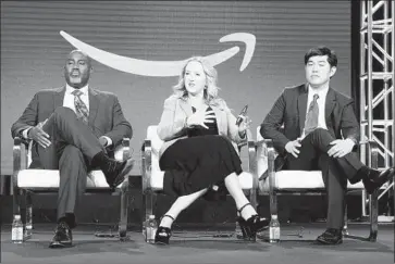  ?? Frederick M. Brown Getty Images ?? AMAZON STUDIOS chief Jennifer Salke and co-heads of television Vernon Sanders, left, and Albert Cheng last week at the Television Critics Assn. conference in Pasadena, where Amazon announced 17 new shows.