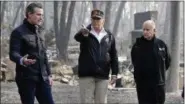  ?? EVAN VUCCI ?? FILE - In this Nov. 17, 2018, file photo, President Donald Trump talks with then Gov.-elect Gavin Newsom, left, and as California Gov. Jerry Brown listens during a visit to a neighborho­od impacted by the wildfires in Paradise, Calif. California Gov.