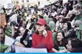  ??  ?? Algerian students chant slogans yesterday as they continue their weekly protests in the capital Algiers to demand the overthrow of the ‘system’. —AFP