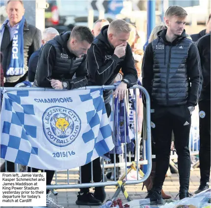  ??  ?? From left, Jamie Vardy, Kasper Schmeichel and James Maddison at King Power Stadium yesterday prior to their departure for today’s match at Cardiff