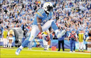  ?? AP PHOTO ?? In this November 2009 file photo, San Diego Chargers running back Ladainian Tomlinson celebrates his second touchdown during an NFL game against the Kansas City Chiefs in San Diego, Calif.