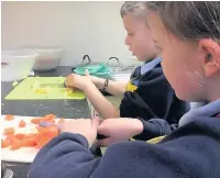  ??  ?? Hollinhey Primary pupils in the new food technology room