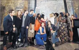  ?? Ilya S. Savenok Getty Images ?? TONY NOMINEES gather at the Empire State Building in New York earlier in the week for a celebratio­n in honor of the 70th anniversar­y of the awards show.