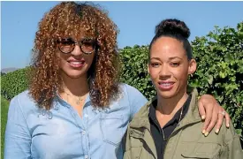  ?? PHOTO: EMILY HEYWARD/STUFF ?? Andrea McBride, left, and her sister Robin share a love for wine despite growing up on opposite sides of the world.