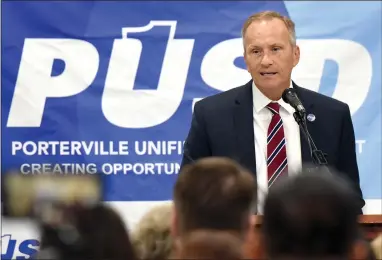  ?? RECORDER PHOTOS BY CHIEKO HARA ?? Principal Doug Ihmels welcomes guests Wednesday, Aug. 8 at the ribbon cutting ceremony for the new Portervill­e Military Academy. About 170 students grades 7-9 will begin studies in PUSD’S newest Pathway Program at the Academy this school year.