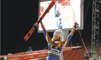  ?? Christophe Pallot / Agence Zoom / Getty Images ?? Mikaela Shiffrin exults in her World Cup parallel slalom victory in Courchevel, France.