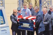  ?? JIM THOMPSON/JOURNAL ?? Bobby Unser’s pallbearer­s included Willy T. Ribbs, Al Unser Jr., Colt Weister, Robby Unser, Johnny Unser, Dr. Jim Rice and Paul Hudson. Bobby Unser grew up in Albuquerqu­e with his famous racing family.