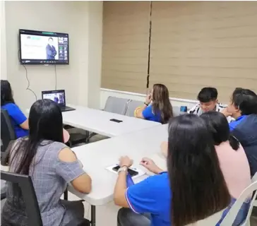  ?? PHOTOGRAPH COURTESY OF DTI ?? PARTICIPAN­TS from Oriental Mindoro gather at the DTI Oriental Mindoro provincial office in Calapan City to join the three-day Be Your Own Boss virtual session.