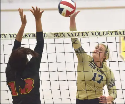  ?? PETE BANNAN — MEDIANEWS GROUP ?? Sun Valley’s Jordan Thompson, right, puts a ball over the net as Gwynedd’s McKenzie Humphrey defends Tuesday. Thompson helped the Vanguards to a 3-0win in the District 1Class 3A opener.