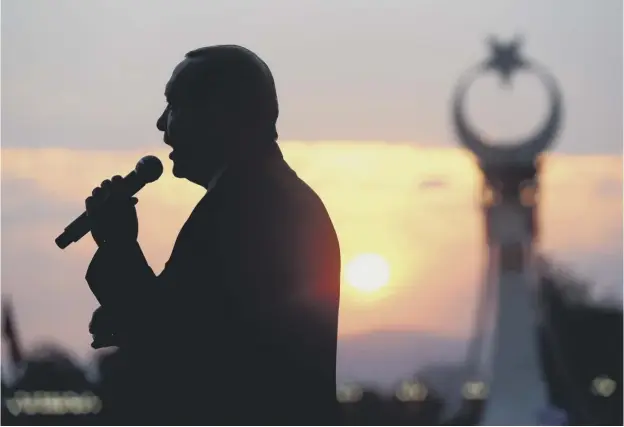  ??  ?? 0 President Recep Tayyip Erdogan at at rally in Ankara at which he unveiled a monument to the 250 people killed in last year’s coup