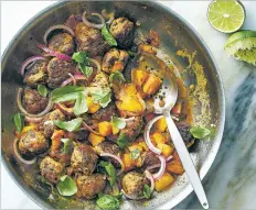  ?? BRYAN GARDNER/NEW YORK TIMES ?? Skillet meatballs with peaches, basil and lime. Quickly made in a skillet with ripe peaches, basil and lime juice, these meatballs are perfect for weeknights.