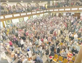  ?? ?? The photograph shows the chapel gathering of students at Asbury College in Kentucky USA, This is a renowned Christian college of many years, where in the 1970s revival broke out in the same chapel with