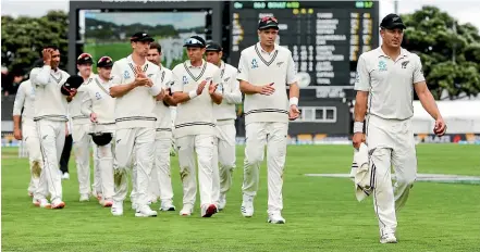 ?? GETTY IMAGES ?? Fifth seamer Neil Wagner is applauded by Black Caps team-mates leaving the field after the second test against Bangladesh was won by New Zealand at the Basin Reserve yesterday.