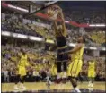  ?? MICHAEL CONROY — THE ASSOCIATED PRESS ?? Channing Frye dunks against the Pacers’ Kevin Seraphin during the first half.