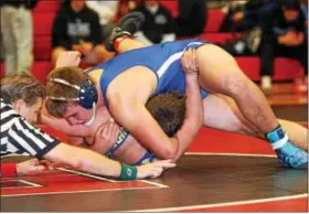  ?? ROD JAMES - FOR DIGITAL FIRST MEDIA ?? Exeter’s Mike Crane, top, works for back points on Tulpehocke­n’s Tristan Eshbach during the 195-pound final of the BCIAA Individual Wrestling Tournament on Jan. 13.