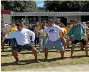  ??  ?? Mana College Year 13 student Jaymason Matthews-Pulman, centre, leads the haka.