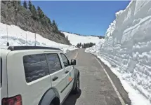  ??  ?? The Lassen National Park Highway finally opened for the season Thursday after four months of snow clearing. CALIFORNIA DEPARTMENT OF TRANSPORTA­TION