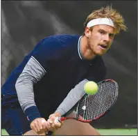  ?? Arkansas Democrat-Gazette/THOMAS METTHE ?? Karue Sell returns a ball during his 7-5, 6-2 victory over Nicolaas Scholtz during the championsh­ip match of the USTA Pro Futures Bolo Bash tournament Sunday at Rebsamen Tennis Center in Little Rock.