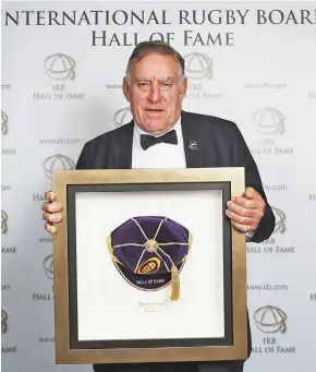  ?? Photo: Zimbio ?? Former All Black Sir Colin Meads poses with his World Rugby Hall of Fame cap during the New Zealand Rugby Annual Reunion Dinner at the Langham Hotel on August 22, 2014 in Auckland, New Zealand.